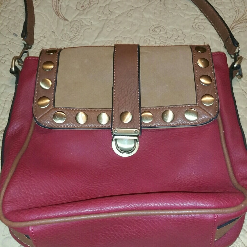 MMS crossbody bag  color is deep red and tan